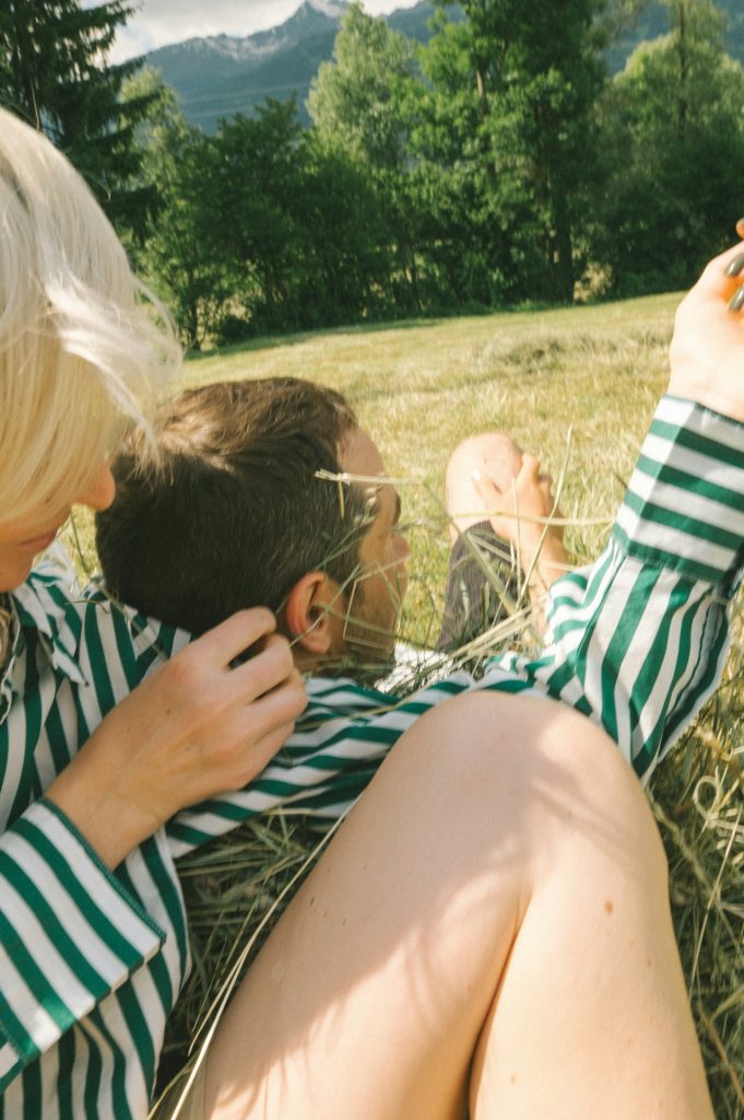 couple enjoying together on a field